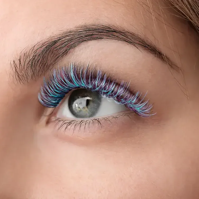 Graduate wearing curled volume lash extensions for her celebration.