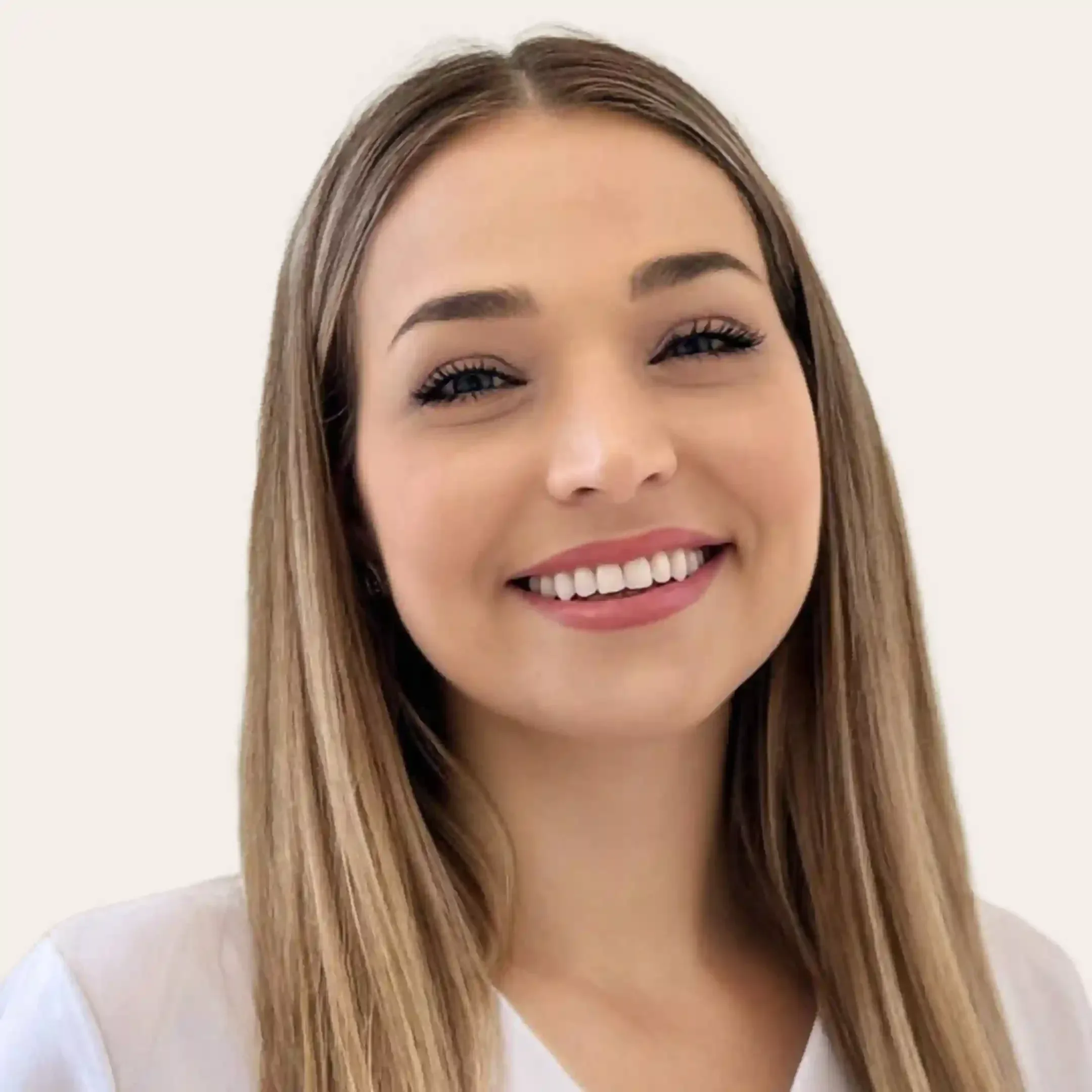 Esthetician Yelena in a calm circular professional portrait.