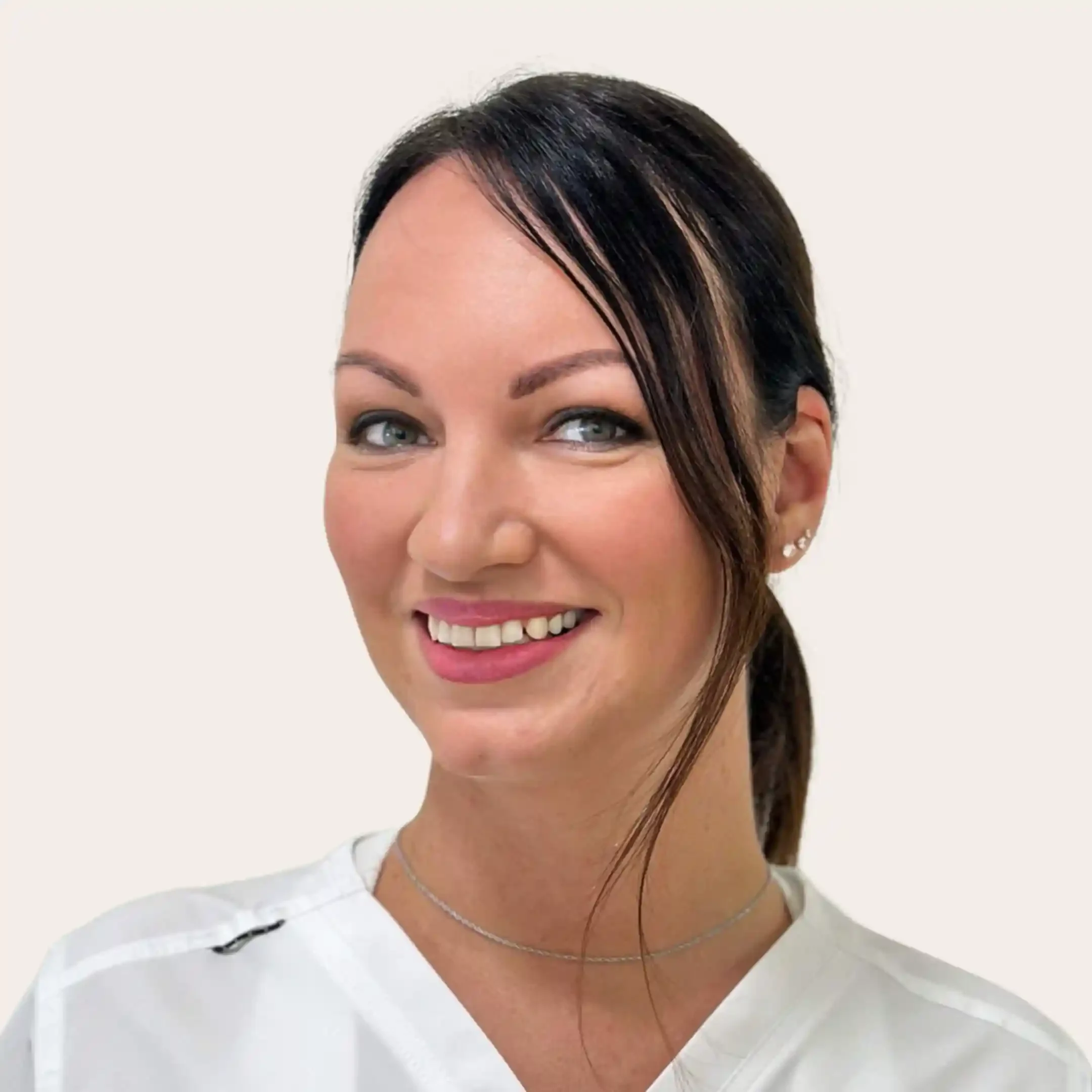 Licensed esthetician Marina smiling confidently, expert in micro-needling and advanced skincare techniques
