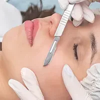 Client undergoing dermaplaning facial service with blade exfoliation for texture and complexion enhancement