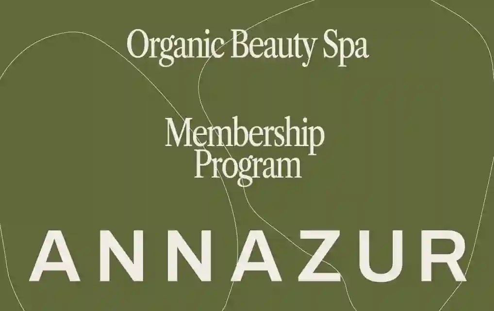 ANNAZUR Organic Beauty Spa membership program card displaying elegant green design with brand lettering and program details